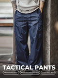 Pantalon cargo MADEN M65 pour homme, grandes poches, style utilitaire polyvalent pour les déplacements quotidiens, idéal pour le jogging, le camping et les activités de plein air. Pantalon long en nylon bleu.  selected product image