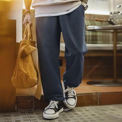 Pantalon de jogging décontracté MADEN pour homme, coupe ample, jambes droites, idéal pour le sport et la course à pied. Confortable et polyvalent. 