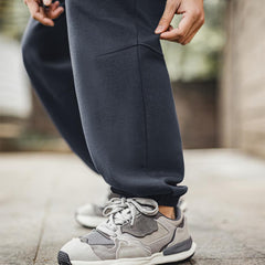 Pantalon de jogging décontracté MADEN pour homme, coupe ample, jambes droites, idéal pour le sport et la course à pied. Confortable et polyvalent. 