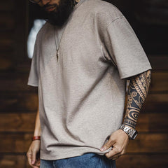 Camiseta de algodón pesado de ajuste relajado y cuello redondo MADEN