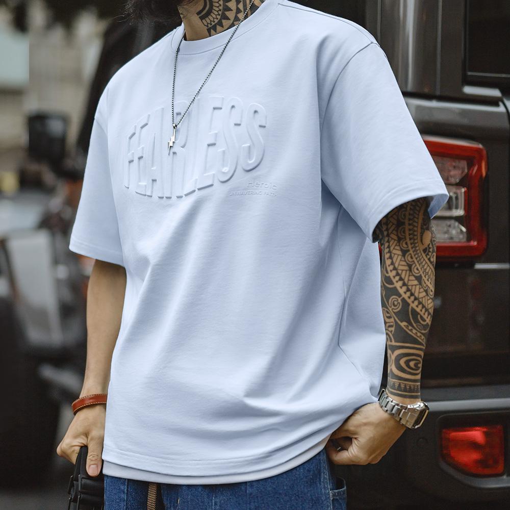 Camiseta de algodón pesado con estampado de letras en relieve 3D MADEN