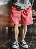 MADEN Men's Embroidery Loose-Fit Drawstring Beach Shorts thumbnail