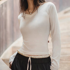 T-shirt à manches longues en maille de coton, col V, coupe ajustée, pour femme, idéal pour l'automne et l'hiver. Pull basique à porter sous un pull. 