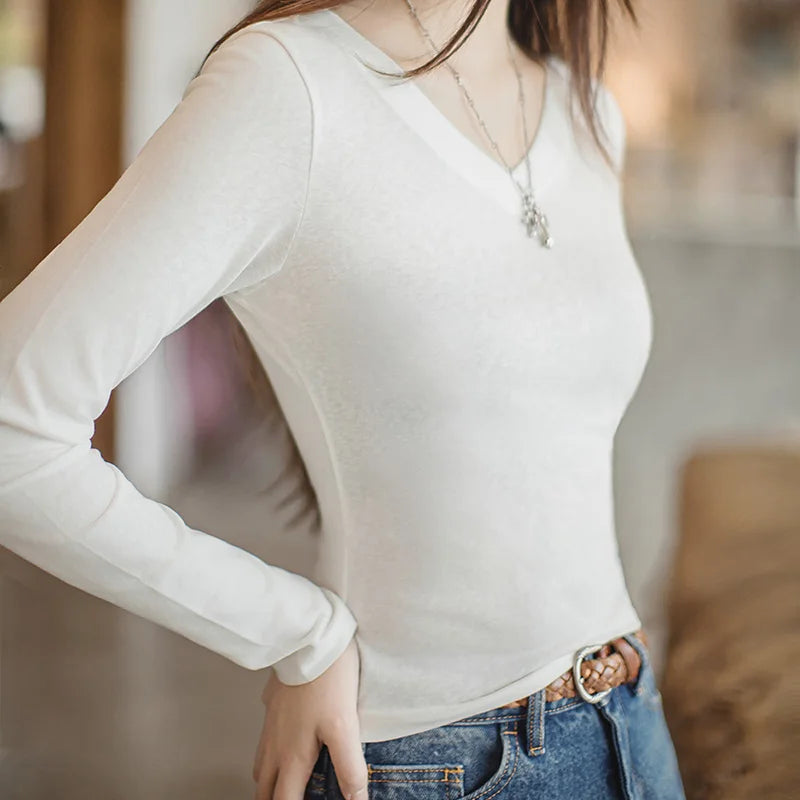 T-shirt à manches longues en maille de coton, col V, coupe ajustée, pour femme, idéal pour l'automne et l'hiver. Pull basique à porter sous un pull. 