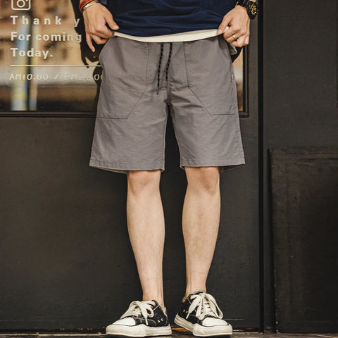 Pantalones cortos casuales al aire libre MADEN para hombre, ligeros, con bolsillos grandes, plisados, sueltos, con cordón, pantalones cortos rectos de nylon tejido