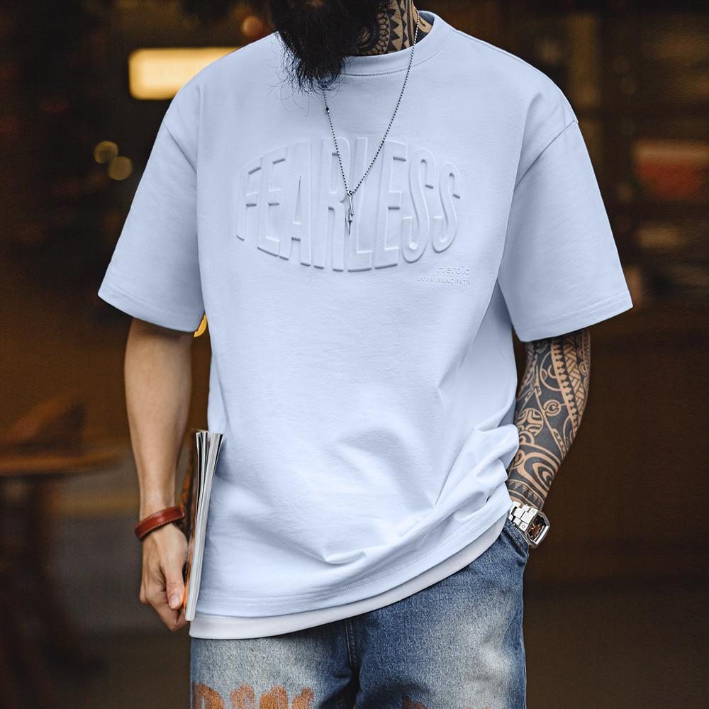 Camiseta de algodón pesado con estampado de letras en relieve 3D MADEN