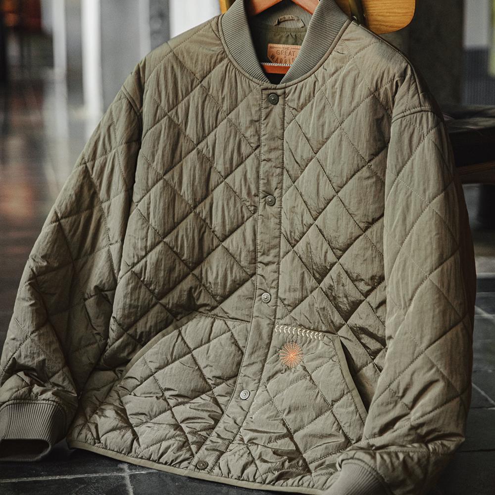 Chaqueta varsity acolchada de algodón de peso pesado para hombre MADEN