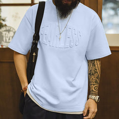 Camiseta de algodón pesado con estampado de letras en relieve 3D MADEN