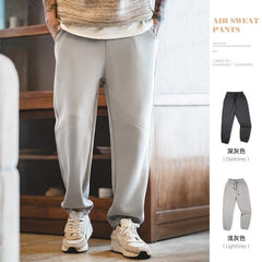 Pantalon de jogging décontracté MADEN pour homme, en coton, avec cordon de serrage, taille élastique, coupe droite et ample, style jogging essentiel. 