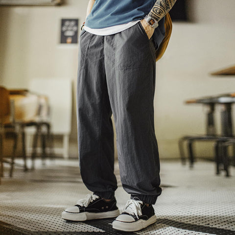 Pantalon de jogging imperméable pour homme MADEN, pantalon cargo léger et décontracté, taille élastique, coupe fuselée, idéal pour le streetwear et les trajets quotidiens. 